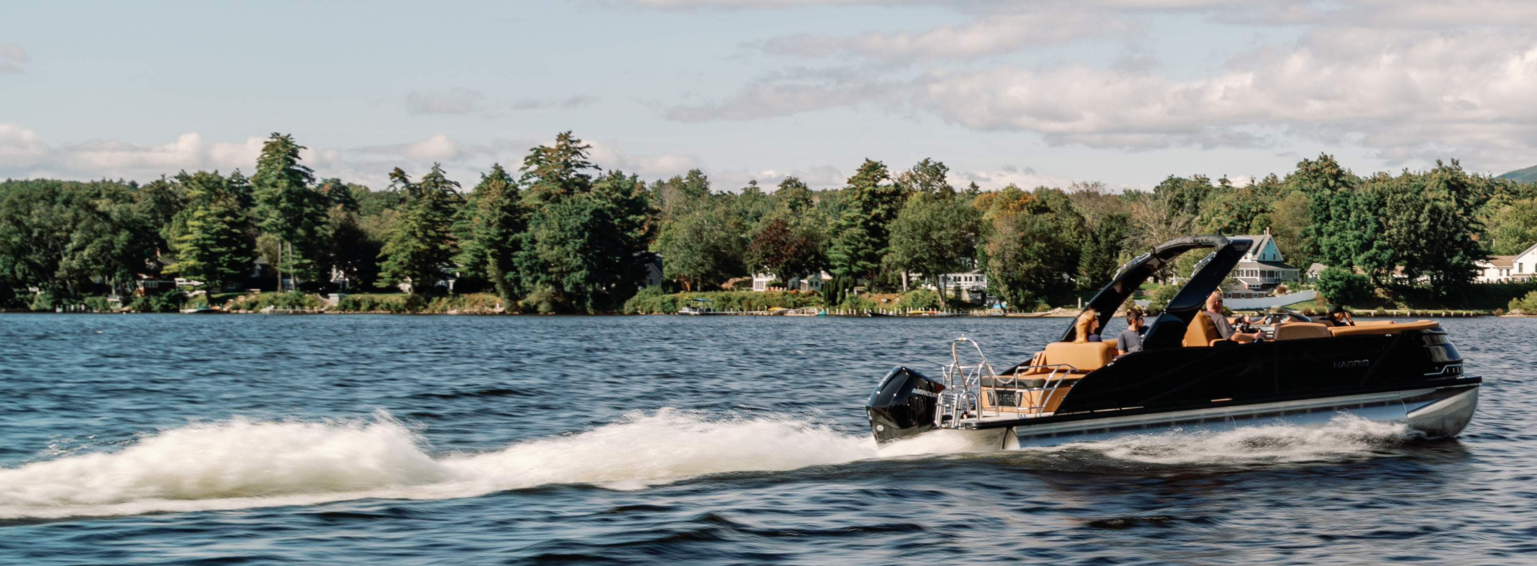 A Lund boat with two fishermen inside. 